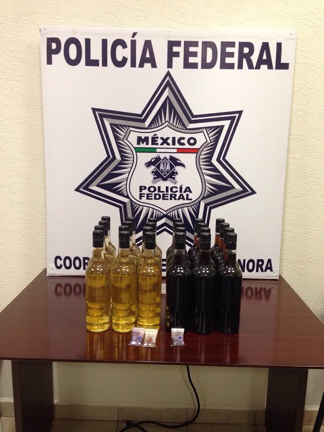 Policía Federal decomisa 18 litros de metanfetamina líquida oculta en botellas de vino