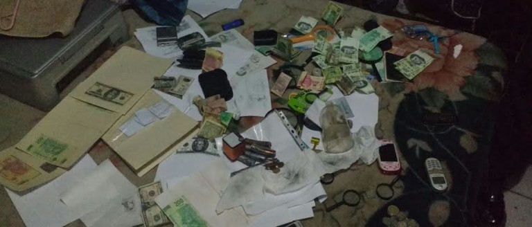 Desmantelan laboratorio de billetes falsos; detienen a 9 involucrados junto con droga y dinero